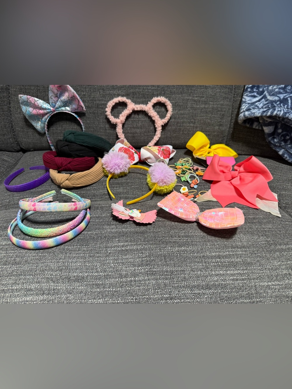 Bundle of girls hair accessories and a small little girls purse.